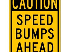 Caution Speed Bumps Ahead Sign